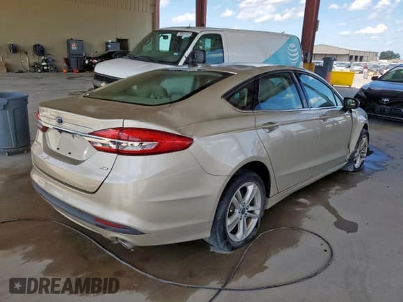 ✅ 2018 Ford Fusion SE • VIN: 3FA6P0H77JR238054 • Lot: 82061785. Wystawiony na Copart z przebiegiem 110 208 mil. Bezpłatny archiwum sprzedaży aukcyjnych z USA i szczegółowy raport historii pojazdu na DreamBid. Zdjęcie 3.