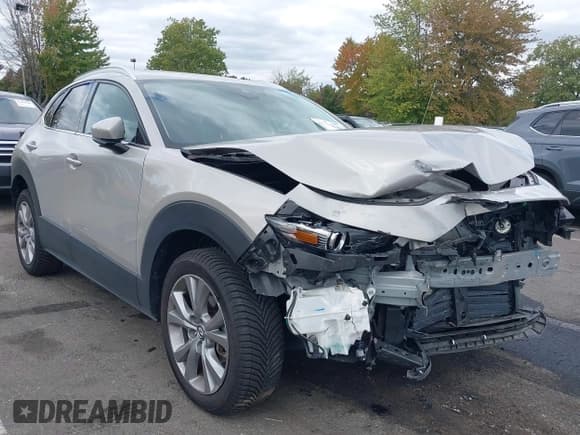 ✅ 2023 Mazda CX-30 S Premium • VIN: 3MVDMBDM9PM524882 • Лот: 43425048. Опубликован ранее на IAAI с пробегом 44 264 миль. Бесплатный доступ к архиву аукционных продаж из США и подробный отчёт об истории автомобиля на DreamBid. Изображение 1.