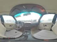 ✅ 1987 BMW 3 Series 325e • VIN: WBAAE6403H8820635 • Lot: 55409915. Wystawiony na Copart z przebiegiem 150 092 mil. Bezpłatny archiwum sprzedaży aukcyjnych z USA i szczegółowy raport historii pojazdu na DreamBid. Zdjęcie 14.