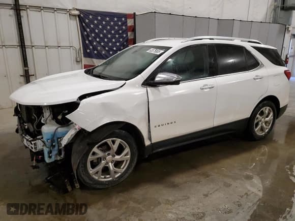 ✅ 2018 Chevrolet Equinox Premier • VIN: 2GNAXVEVXJ6121202 • Lot: 92875885. Listed on Copart with 122,946 mi. Free auction sales archive from the USA and detailed vehicle history report at DreamBid. Image 1.