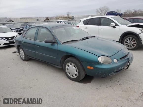 ✅ 1997 Ford Taurus G • VIN: 1FALP51U2VG299048 • Lot: 85742504. Wystawiony na Copart z przebiegiem 123 356 mil. Bezpłatny archiwum sprzedaży aukcyjnych z USA i szczegółowy raport historii pojazdu na DreamBid. Zdjęcie 4.