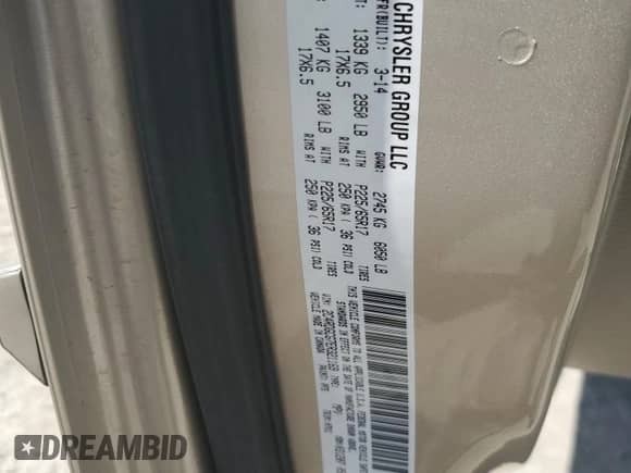 2014 Dodge Grand Caravan SXT z VIN 2C4RDGCG7ER321169, wystawiony jako Copart lot #70516105 z przebiegiem 187 876 mil mil oraz Szkoda całkowita • Salvage title. Historia ofert i sprzedaży dostępna na DreamBid. Obrazek 13.