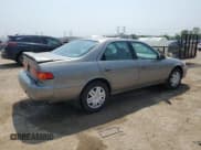 ✅ 2000 Toyota Camry LE • VIN: 4T1BF22K9YU106450 • Lot: 58820615. Listed on Copart with 63,820 mi. Free auction sales archive from the USA and detailed vehicle history report at DreamBid. Image 3.