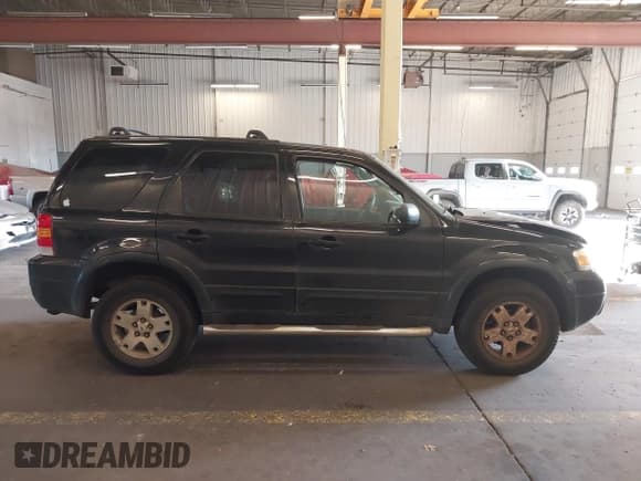 ✅ 2007 Ford Escape Limited • VIN: 1FMCU04187KA15988 • Лот: 42979991. Опубликован ранее на IAAI с пробегом 194 341 миль. Бесплатный доступ к архиву аукционных продаж из США и подробный отчёт об истории автомобиля на DreamBid. Изображение 14.