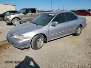 2002 Honda Accord EX with VIN JHMCG56642C007938, listed as a Copart auction lot 91113885 with 214,242 mi miles and Clean title. Bid and sale history available at DreamBid. Image 1.