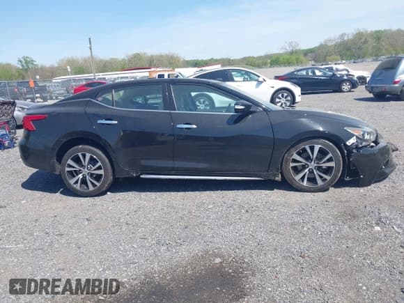 ✅ 2018 Nissan Maxima SV • VIN: 1N4AA6AP3JC407820 • Lot: 42098941. Listed on IAAI with 65,071 mi. Free auction sales archive from the USA and detailed vehicle history report at DreamBid. Image 14.