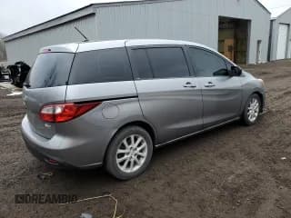 ✅ 2014 Mazda 5 Touring • VIN: JM1CW2CLXE0169219 • Лот: 41236014. Опубликован ранее на Copart с пробегом 85 236 миль. Бесплатный доступ к архиву аукционных продаж из США и подробный отчёт об истории автомобиля на DreamBid. Изображение 3.