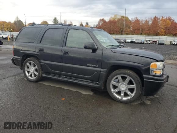 ✅ 2004 GMC Yukon Denali • VIN: 1GKEK63U44J256874 • Lot: 91089225. Listed on Copart with 122,338 mi. Free auction sales archive from the USA and detailed vehicle history report at DreamBid. Image 4.