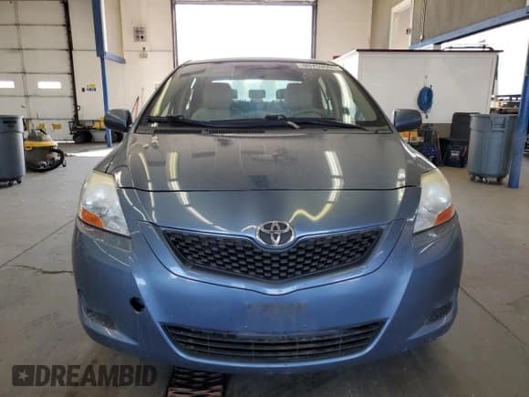 ✅ 2009 Toyota Yaris • VIN: JTDBT903891313710 • Лот: 80753565. Опубликован ранее на Copart с пробегом 149 411 миль. Бесплатный доступ к архиву аукционных продаж из США и подробный отчёт об истории автомобиля на DreamBid. Изображение 5.