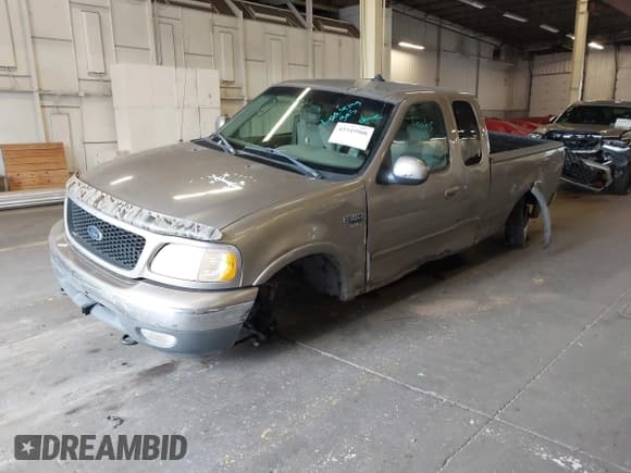 ✅ 2002 Ford F-150 XL • VIN: 2FTRX18W82CA77289 • Lot: 43545908. Listed on IAAI with Not provided. Free auction sales archive from the USA and detailed vehicle history report at DreamBid. Image 2.