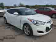 2013 Hyundai Veloster w/Gray Int с VIN KMHTC6AD0DU167414, выставлен на аукционе Copart как лот 73476894 с пробегом 119 928 миль миль и Списание • Salvage title. История ставок и продаж доступна на DreamBid. Изображение 4.