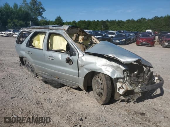 ✅ 2005 Mercury Mariner Luxury • VIN: 4M2CU56105DJ16436 • Lot: 60228385. Listed on Copart with Not provided. Free auction sales archive from the USA and detailed vehicle history report at DreamBid. Image 4.