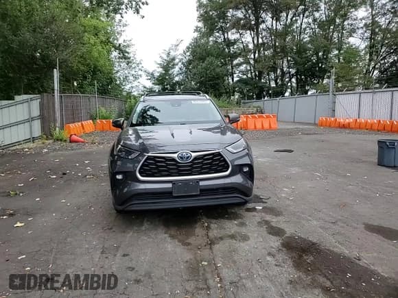 ✅ 2022 Toyota Highlander Hybrid XLE • VIN: 5TDHBRCH6NS540878 • Lot: 80414265. Listed on Copart with 76,899 mi. Free auction sales archive from the USA and detailed vehicle history report at DreamBid. Image 14.