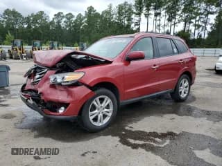 ✅ 2012 Hyundai Santa Fe Limited • VIN: 5XYZK3ABXCG109258 • Lot: 80007885. Listed on Copart with 93,490 mi. Free auction sales archive from the USA and detailed vehicle history report at DreamBid. Image 1.
