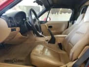 ✅ 2000 Mazda MX-5 Miata • VIN: JM1NB3532Y0142124 • Lot: 66543565. Wystawiony na Copart z przebiegiem 76 868 mil. Bezpłatny archiwum sprzedaży aukcyjnych z USA i szczegółowy raport historii pojazdu na DreamBid. Zdjęcie 7.