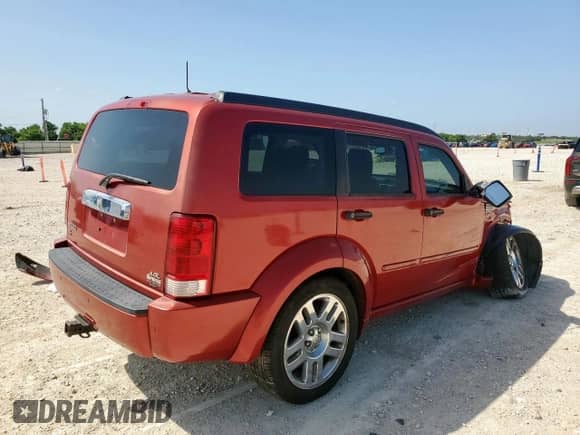 2008 Dodge Nitro R/T with VIN 1D8GT58628W127399, listed as a Copart auction lot 61335475 with 106,255 mi miles and Salvage title. Bid and sale history available at DreamBid. Image 3.