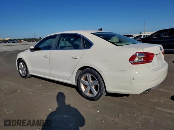 ✅ 2012 Volkswagen Passat SE • VIN: 1VWBH7A3XCC065697 • Lot: 96518195. Listed on Copart with 166,646 mi. Free auction sales archive from the USA and detailed vehicle history report at DreamBid. Image 2.