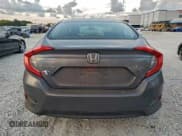✅ 2017 Honda Civic LX • VIN: 19XFC2F59HE017124 • Lot: 94428665. Wystawiony na Copart z przebiegiem 141 765 mil. Bezpłatny archiwum sprzedaży aukcyjnych z USA i szczegółowy raport historii pojazdu na DreamBid. Zdjęcie 6.