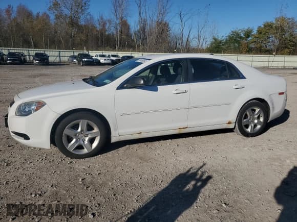✅ 2012 Chevrolet Malibu 1LS • VIN: 1G1ZB5E09CF222344 • Lot: 76659564. Listed on Copart with 84,735 mi. Free auction sales archive from the USA and detailed vehicle history report at DreamBid. Image 1.