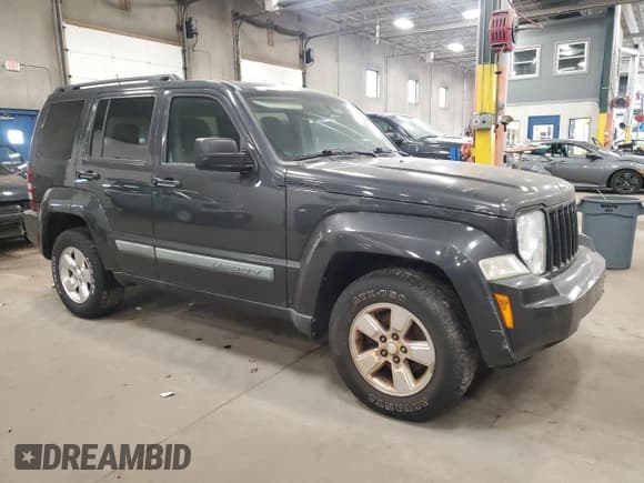 ✅ 2010 Jeep Liberty Sport • VIN: 1J4PN2GK7AW162512 • Lot: 92085285. Listed on Copart with 182,233 mi. Free auction sales archive from the USA and detailed vehicle history report at DreamBid. Image 4.