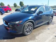 ✅ 2018 Mazda CX-5 Touring • VIN: JM3KFACM5J1473522 • Lot: 43315278. Listed on IAAI with 56,327 mi. Free auction sales archive from the USA and detailed vehicle history report at DreamBid. Image 18.