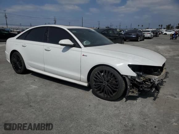✅ 2017 Audi A6 Prestige • VIN: WAUH2AFC4HN061710 • Лот: 48292035. Опубликован ранее на Copart с пробегом 104 484 миль. Бесплатный доступ к архиву аукционных продаж из США и подробный отчёт об истории автомобиля на DreamBid. Изображение 4.