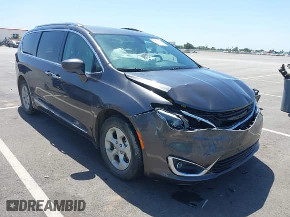 ✅ 2018 Chrysler Pacifica Hybrid Touring L • VIN: 2C4RC1L71JR129532 • Lot: 42064129. Listed on IAAI with 129,665 mi. Free auction sales archive from the USA and detailed vehicle history report at DreamBid. Image 1.