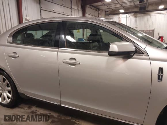 ✅ 2011 Lincoln MKS • VIN: 1LNHL9ER3BG612964 • Lot: 42045297. Listed on IAAI with 106,997 mi. Free auction sales archive from the USA and detailed vehicle history report at DreamBid. Image 13.