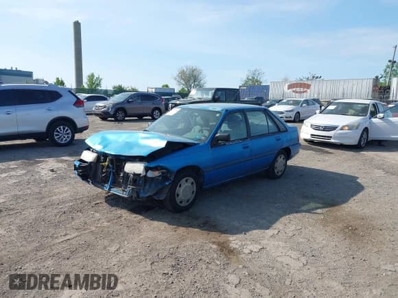 ✅ 1994 Ford Escort • VIN: 1FARP14J1RW244851 • Лот: 42157786. Опубликован ранее на IAAI с пробегом 73 095 миль. Бесплатный доступ к архиву аукционных продаж из США и подробный отчёт об истории автомобиля на DreamBid. Изображение 2.