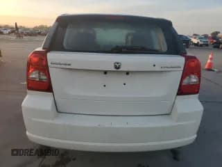 ✅ 2009 Dodge Caliber SE • VIN: 1B3HB28A69D215170 • Лот: 82934314. Опубликован ранее на Copart с пробегом 167 407 миль. Бесплатный доступ к архиву аукционных продаж из США и подробный отчёт об истории автомобиля на DreamBid. Изображение 6.