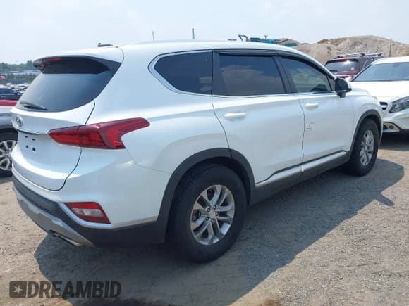✅ 2019 Hyundai Santa Fe SE • VIN: 5NMS23AD3KH135384 • Лот: 42862844. Опубликован ранее на IAAI с пробегом 68 008 миль. Бесплатный доступ к архиву аукционных продаж из США и подробный отчёт об истории автомобиля на DreamBid. Изображение 4.