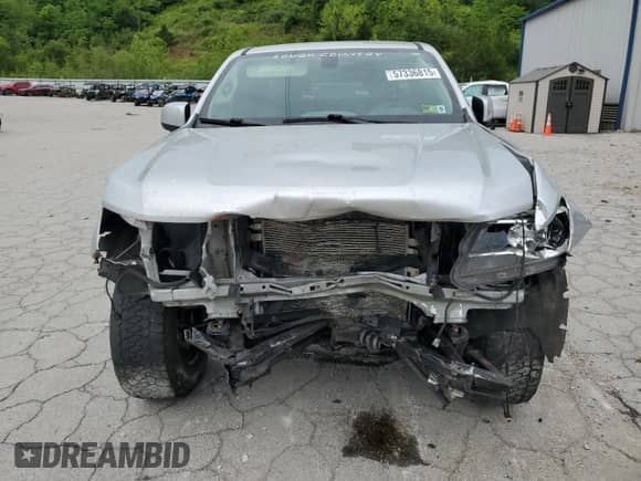 2018 Chevrolet Colorado 4WD Work Truck with VIN 1GCHTBEN2J1208385, listed as a Copart auction lot 57336815 with 136,098 mi miles and Salvage title. Bid and sale history available at DreamBid. Image 5.
