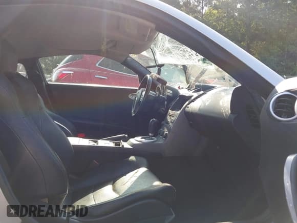 ✅ 2003 Nissan 350Z Touring • VIN: JN1AZ34D43T103694 • Lot: 42602625. Wystawiony na IAAI z przebiegiem 271 699 mil. Bezpłatny archiwum sprzedaży aukcyjnych z USA i szczegółowy raport historii pojazdu na DreamBid. Zdjęcie 5.