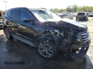 ✅ 2017 Hyundai Santa Fe Ultimate • VIN: 5XYZWDLA0HG425886 • Лот: 66363083. Опубликован ранее на Copart с пробегом 99 009 миль. Бесплатный доступ к архиву аукционных продаж из США и подробный отчёт об истории автомобиля на DreamBid. Изображение 4.