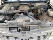 ✅ 1992 GMC Sierra 1500 • VIN: 1GTEC14K7NE501489 • Lot: 60296395. Wystawiony na Copart z przebiegiem 2 714 651 mil. Bezpłatny archiwum sprzedaży aukcyjnych z USA i szczegółowy raport historii pojazdu na DreamBid. Zdjęcie 11.