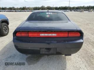 ✅ 2012 Dodge Challenger SXT • VIN: 2C3CDYAG1CH131048 • Lot: 77960354. Wystawiony na Copart z przebiegiem Nie podano. Bezpłatny archiwum sprzedaży aukcyjnych z USA i szczegółowy raport historii pojazdu na DreamBid. Zdjęcie 6.