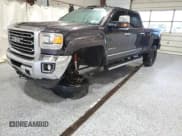 ✅ 2015 GMC Sierra 2500HD SLT • VIN: 1GT12ZE8XFF560969 • Lot: 85907675. Listed on Copart with 230,225 mi. Free auction sales archive from the USA and detailed vehicle history report at DreamBid. Image 1.