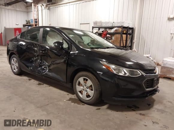 ✅ 2018 Chevrolet Cruze LS • VIN: 1G1BB5SM7J7131573 • Lot: 43507247. Listed on IAAI with 59,735 mi. Free auction sales archive from the USA and detailed vehicle history report at DreamBid. Image 1.