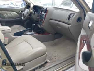 2004 Hyundai Sonata GLS with VIN KMHWF35H94A014600, listed as a IAAI auction lot 41031062 with 128,512 mi miles and . Bid and sale history available at DreamBid. Image 5.