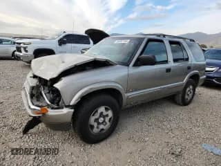 2003 Chevrolet Blazer LS z VIN 1GNDT13XX3K117804, wystawiony jako Copart lot #80397155 z przebiegiem 139 797 mil mil oraz Szkoda całkowita • Salvage title. Historia ofert i sprzedaży dostępna na DreamBid. Obrazek 1.