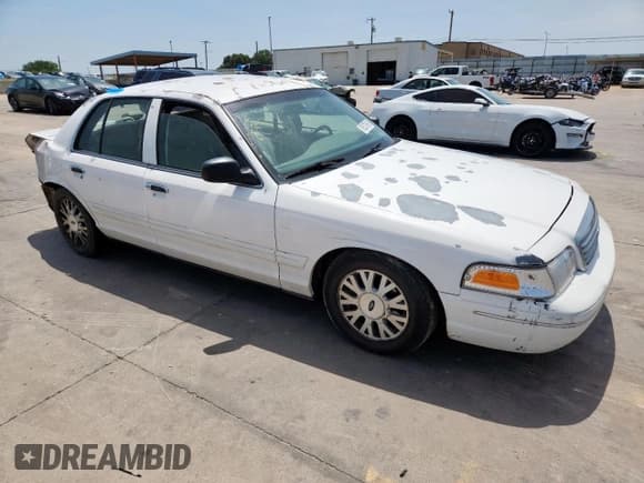 ✅ 2004 Ford Crown Victoria LX • VIN: 2FAFP74WX4X156055 • Lot: 65376995. Wystawiony na Copart z przebiegiem 178 180 mil. Bezpłatny archiwum sprzedaży aukcyjnych z USA i szczegółowy raport historii pojazdu na DreamBid. Zdjęcie 4.
