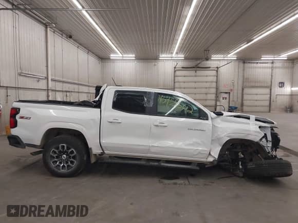 2025 Chevrolet Colorado 4WD Z71 with VIN 1GCPTDEK3S1121299, listed as a IAAI auction lot 43455862 with 2,148 mi miles and . Bid and sale history available at DreamBid. Image 13.