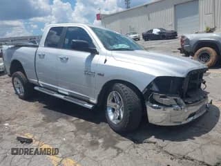✅ 2015 Ram 1500 SLT • VIN: 1C6RR6GT4FS510890 • Lot: 42734264. Listed on IAAI with 218,194 mi. Free auction sales archive from the USA and detailed vehicle history report at DreamBid. Image 1.