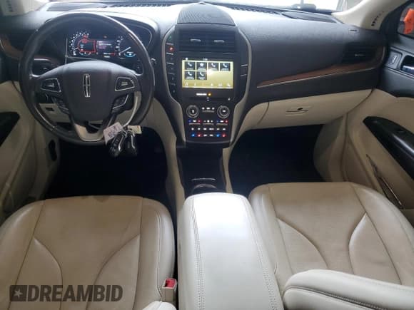 ✅ 2016 Lincoln MKC Reserve • VIN: 5LMCJ3D99GUJ27118 • Lot: 70998345. Listed on Copart with 98,817 mi. Free auction sales archive from the USA and detailed vehicle history report at DreamBid. Image 8.