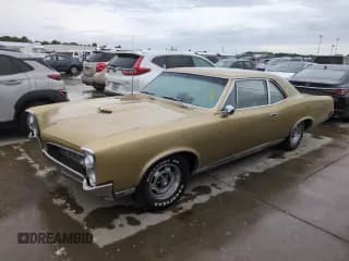 ✅ 1967 Pontiac GTO • VIN: 242077Z108825 • Лот: 74747314. Опубликован ранее на Copart с пробегом 84 793 миль. Бесплатный доступ к архиву аукционных продаж из США и подробный отчёт об истории автомобиля на DreamBid. Изображение 1.
