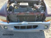 ✅ 2001 Dodge Dakota Sport • VIN: 1B7HG2AN71S325450 • Lot: 79815734. Wystawiony na Copart z przebiegiem 115 694 mil. Bezpłatny archiwum sprzedaży aukcyjnych z USA i szczegółowy raport historii pojazdu na DreamBid. Zdjęcie 12.