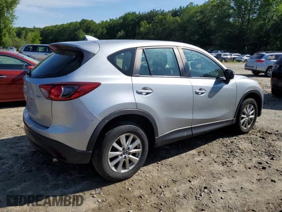 ✅ 2016 Mazda CX-5 Sport • VIN: JM3KE4BY2G0617549 • Lot: 58204555. Listed on Copart with 216,050 mi. Free auction sales archive from the USA and detailed vehicle history report at DreamBid. Image 3.