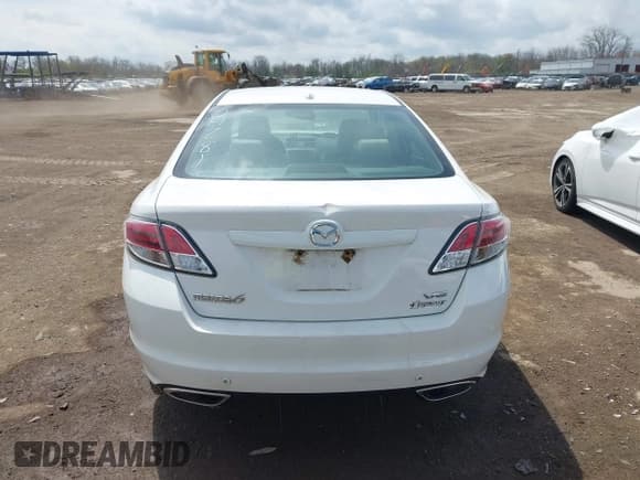 ✅ 2009 Mazda 6 S Grand Touring • VIN: 1YVHP82B995M09281 • Лот: 42060946. Опубликован ранее на IAAI с пробегом 102 423 миль. Бесплатный доступ к архиву аукционных продаж из США и подробный отчёт об истории автомобиля на DreamBid. Изображение 17.