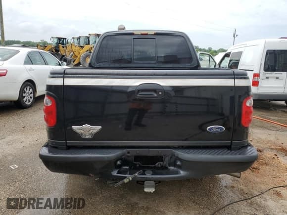 ✅ 2003 Ford F-150 Harley-Davidson • VIN: 1FTRW07333KD41438 • Lot: 54342755. Listed on Copart with 216,391 mi. Free auction sales archive from the USA and detailed vehicle history report at DreamBid. Image 6.