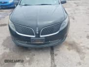 ✅ 2014 Lincoln MKS • VIN: 1LNHL9DK9EG602092 • Lot: 43049470. Wystawiony na IAAI z przebiegiem 302 939 mil. Bezpłatny archiwum sprzedaży aukcyjnych z USA i szczegółowy raport historii pojazdu na DreamBid. Zdjęcie 12.